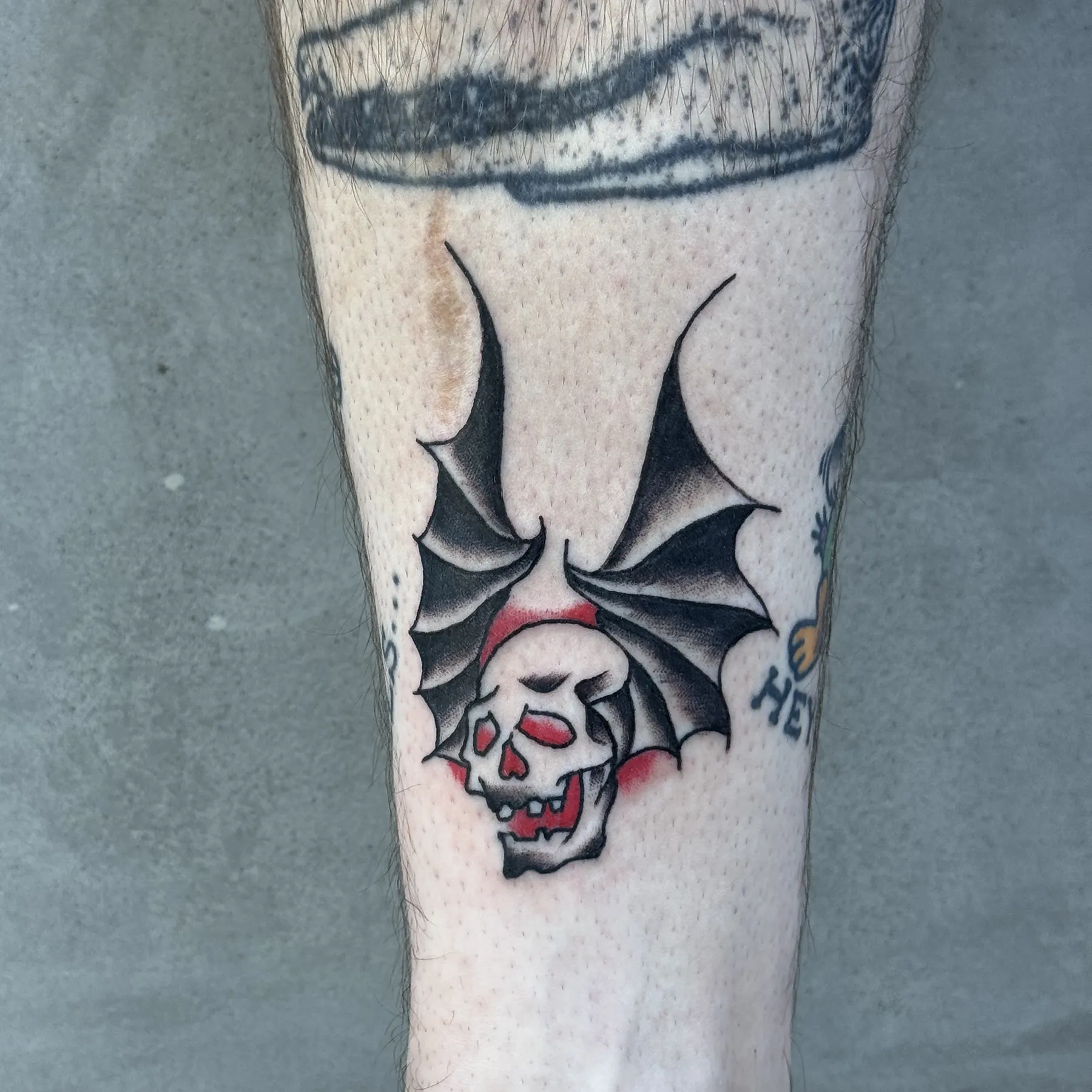Skull with wings tattoo